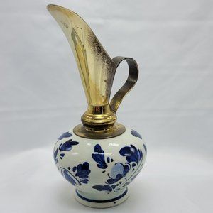 Vintage Delft pitcher with brass spout and handle